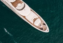 white and black boat on blue sea during daytime